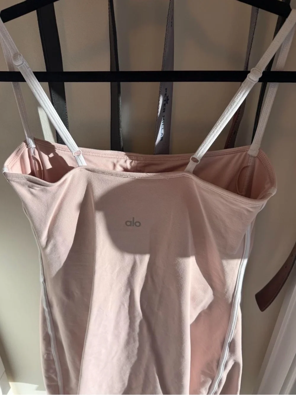 Alo Yoga Airbrush Streamlined Mini Dress in Pink Quartz/White.